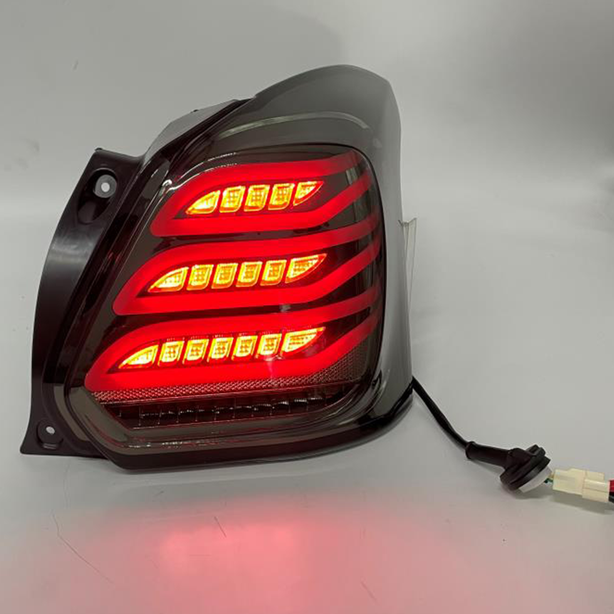 Suzuki Swift 2022 - Back Lava Light Smoke with Red - Thumbnail 2